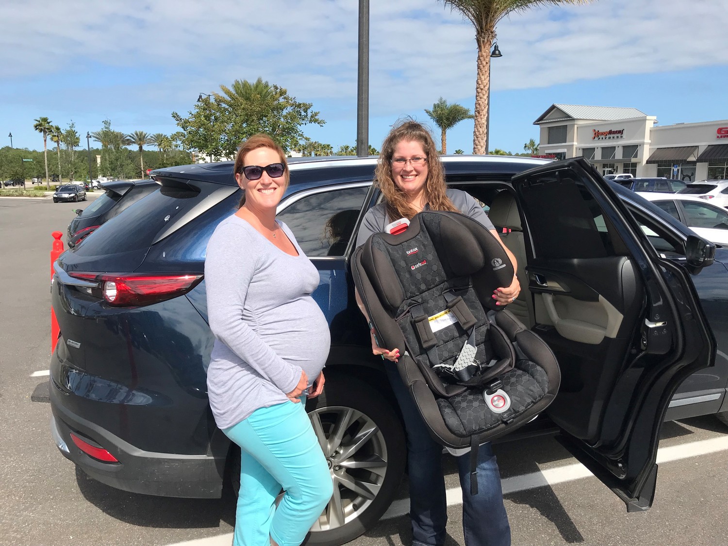 Remax unlimited hosts car seat safety check with st johns county tax